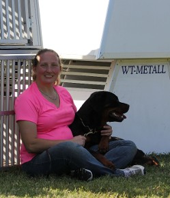 rosann and busa sitting in grass